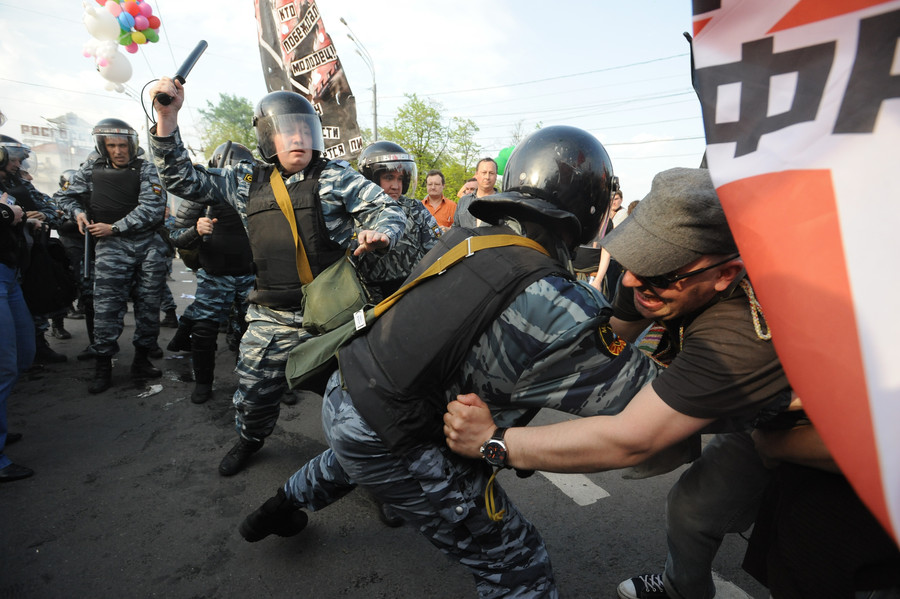 MOSCOW, RUSSIA. MAY 6, 2012. Riot police detain demonstrators during the March of Millions opposition protest in central Moscow. The rally participants are protesting against Vladimir Putin's new term as the Russian president. (Photo ITAR-TASS / Sergei Karpov)
